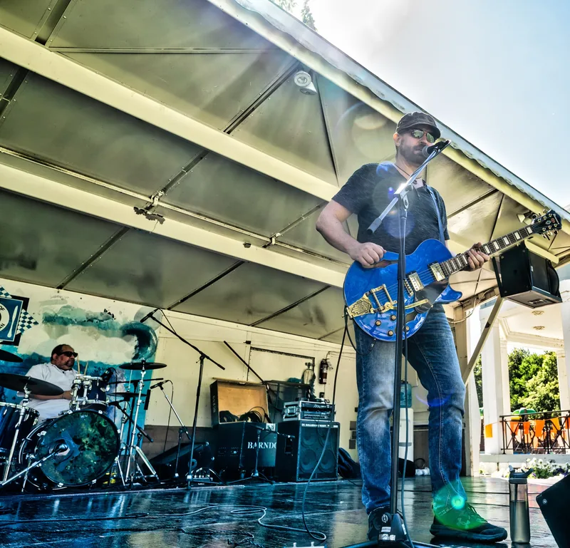 Michael Lander: Live at Taste of Saskatchewan, low angle with drummer